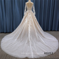 New princess style Long sleeve Boat neck Button Illusion backless wedding dress big puffy tulle lace train